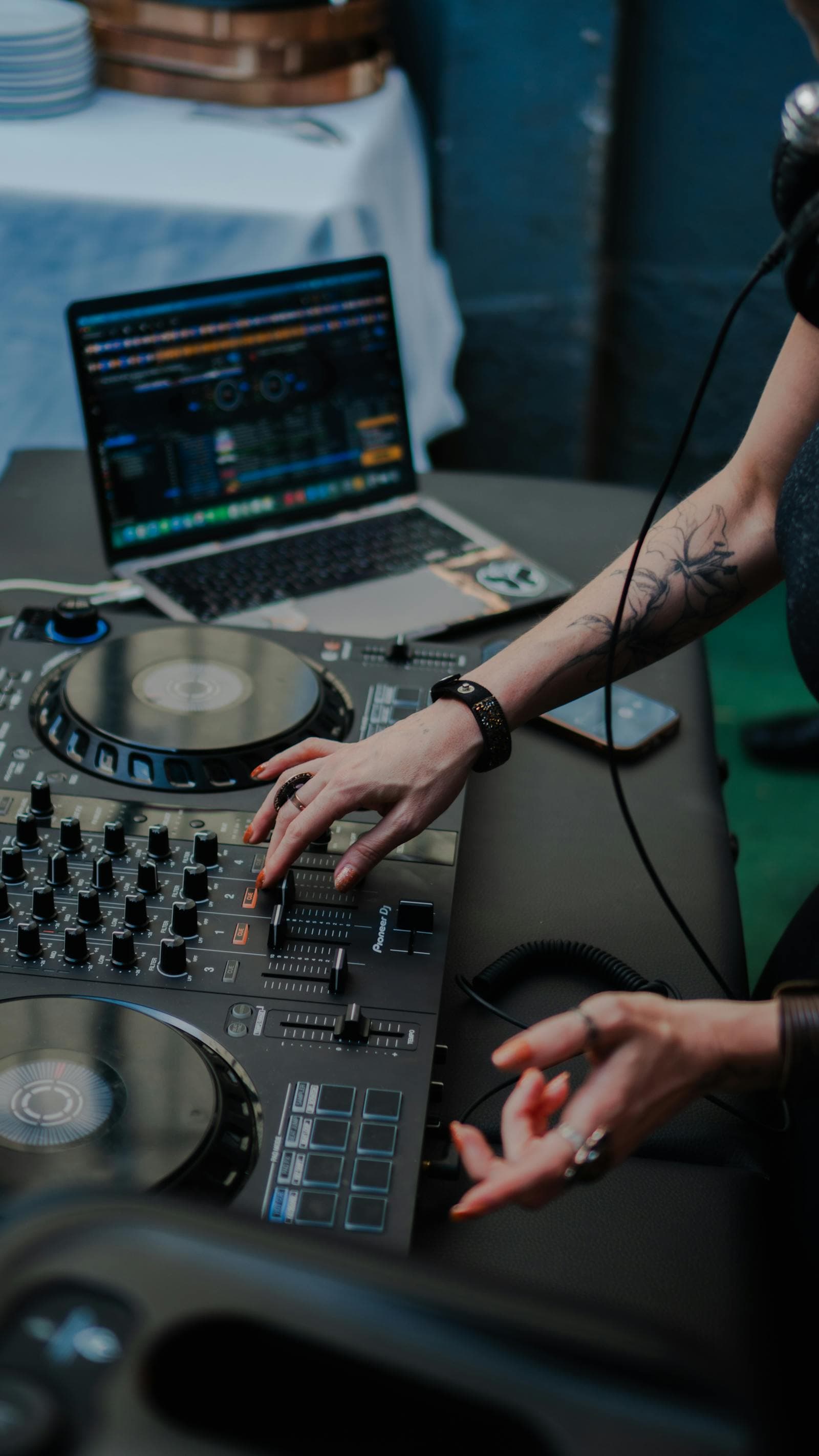 DJ and live band setup at a Spanish destination wedding during peak dancing