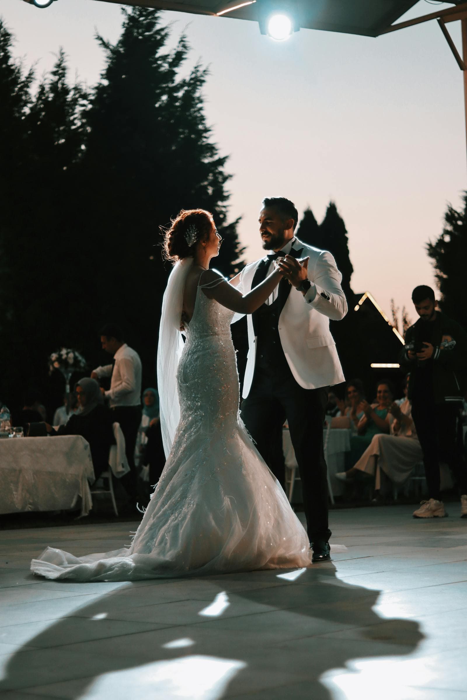 Couple during their wedding first dance at a destination wedding with live band performing