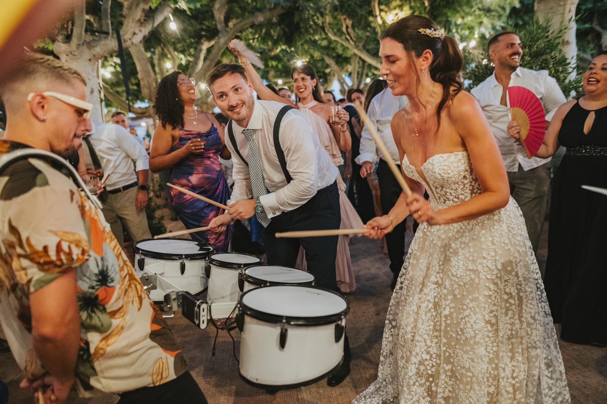 Crowd reaction during the peak of a 200 guest destination wedding live show in Spain